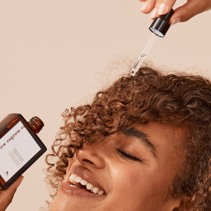 Curly Hair Applying Rosemary Hair Growth Oil