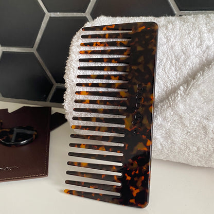 Tortoise Shell Wide Tooth Comb in Bathroom